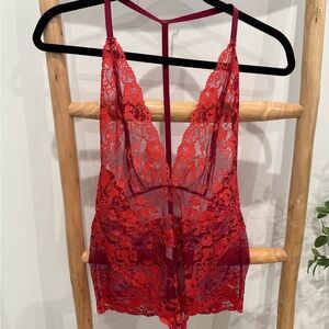 Free People Elegant Lace Bodysuit in red